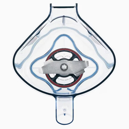 Clear plastic component with a metallic valve on a white background