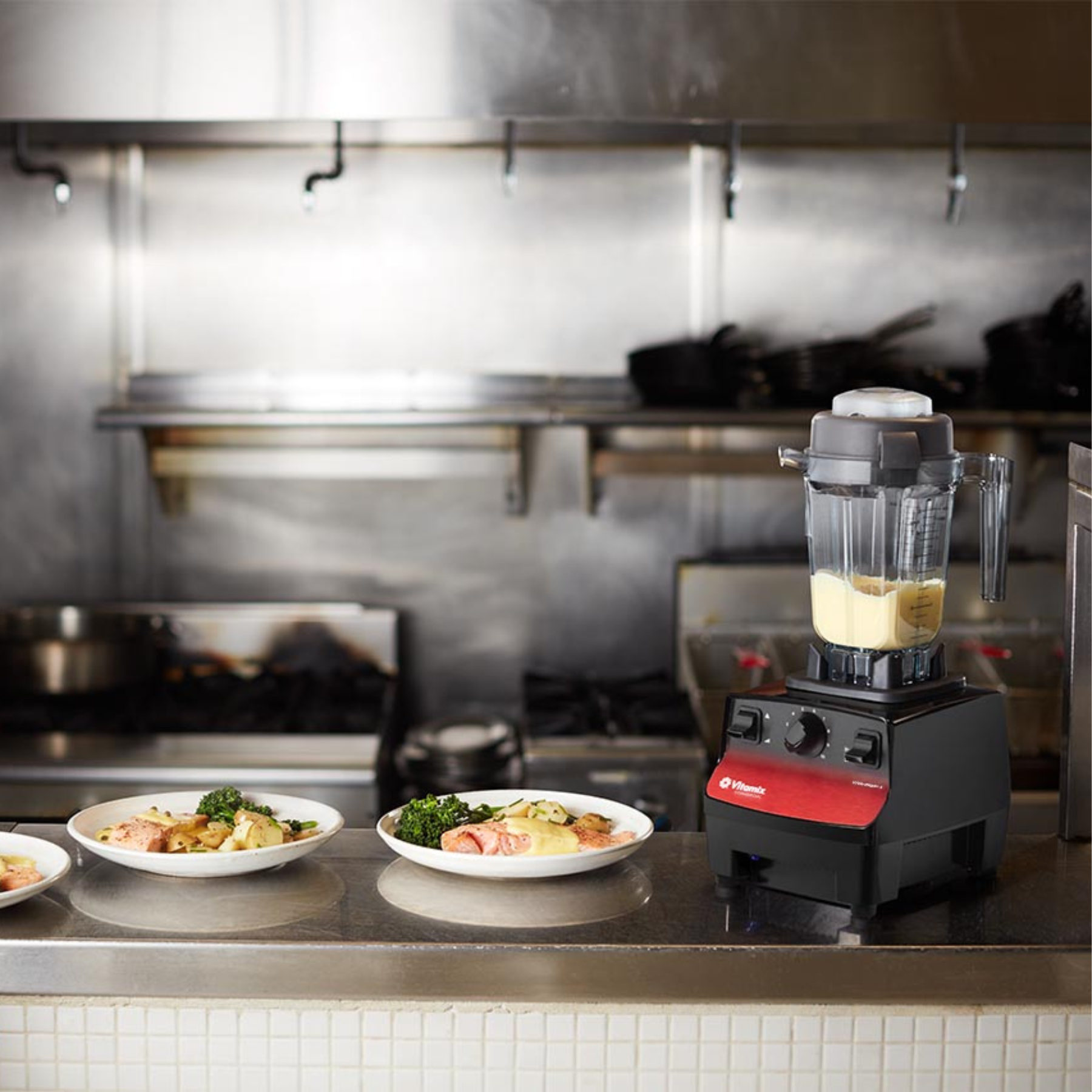 Vitamix Vita-Prep 3 | Blenders Direct on a kitchen counter with plates of food nearby