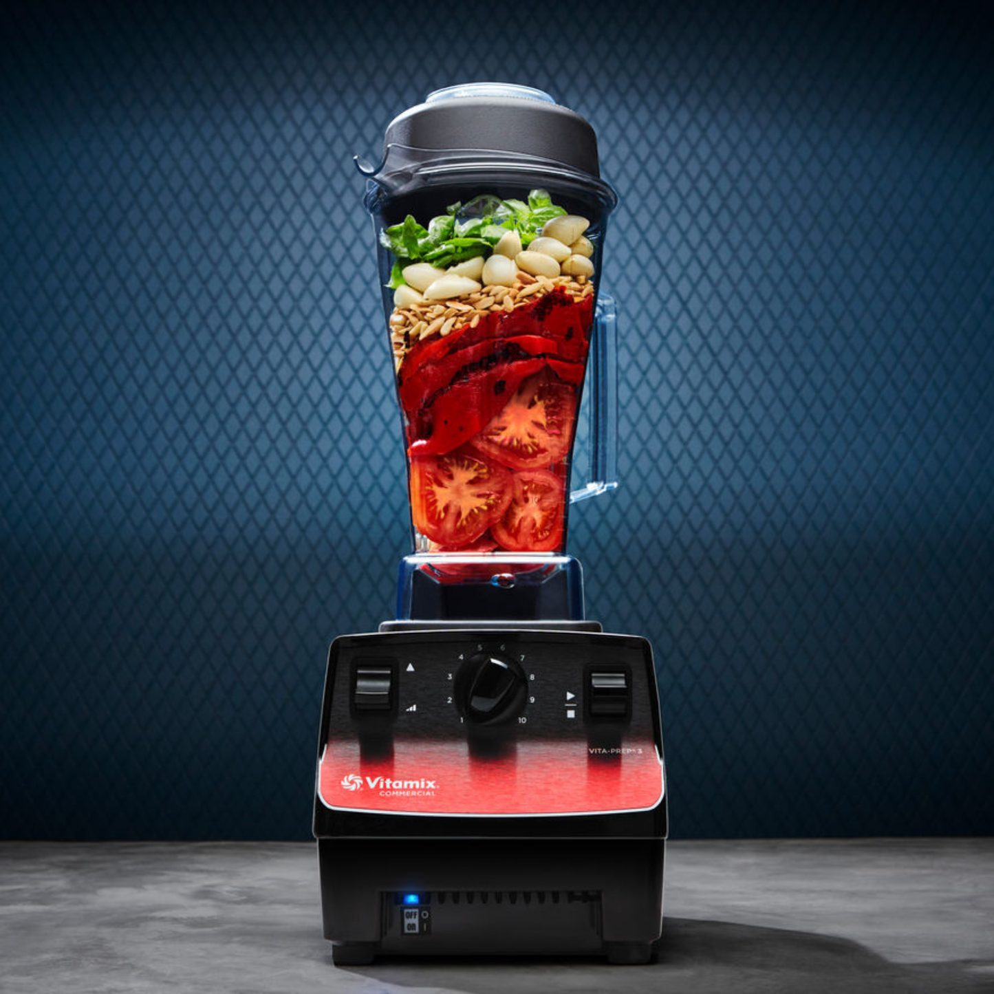 Vitamix Vita-Prep 3 | Blenders Direct with ingredients inside on a dark background